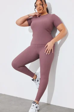 Fits RIBBED CREW NECK SHORT SLEEVE TOP